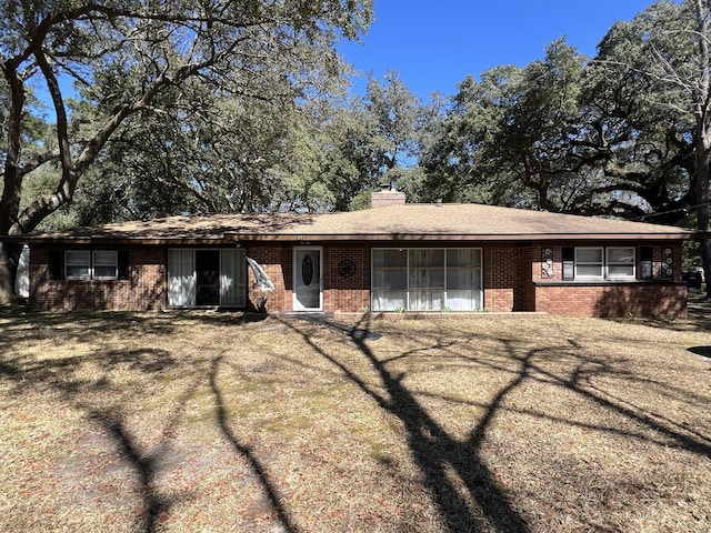 111 Newington Rd, Summerville, SC 29485 - ranch-style home featuring brick siding and a chimney