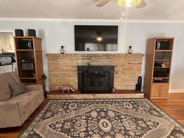 111 Newington Rd, Summerville, SC 29485 - living area featuring a ceiling fan, a textured ceiling, ornamental molding, and wood finished floors