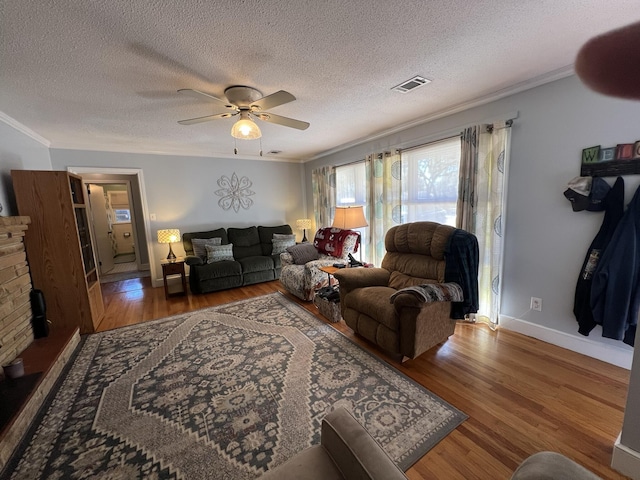 111 Newington Rd, Summerville, SC 29485 - living area with ornamental molding, wood finished floors, and visible vents
