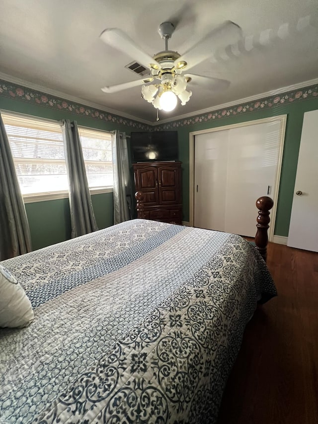 111 Newington Rd, Summerville, SC 29485 - bedroom featuring a closet, visible vents, crown molding, and wood finished floors