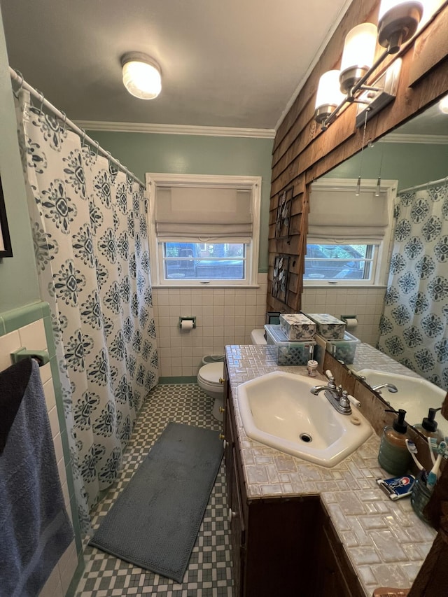111 Newington Rd, Summerville, SC 29485 - bathroom featuring toilet, tile walls, vanity, a shower with curtain, and crown molding