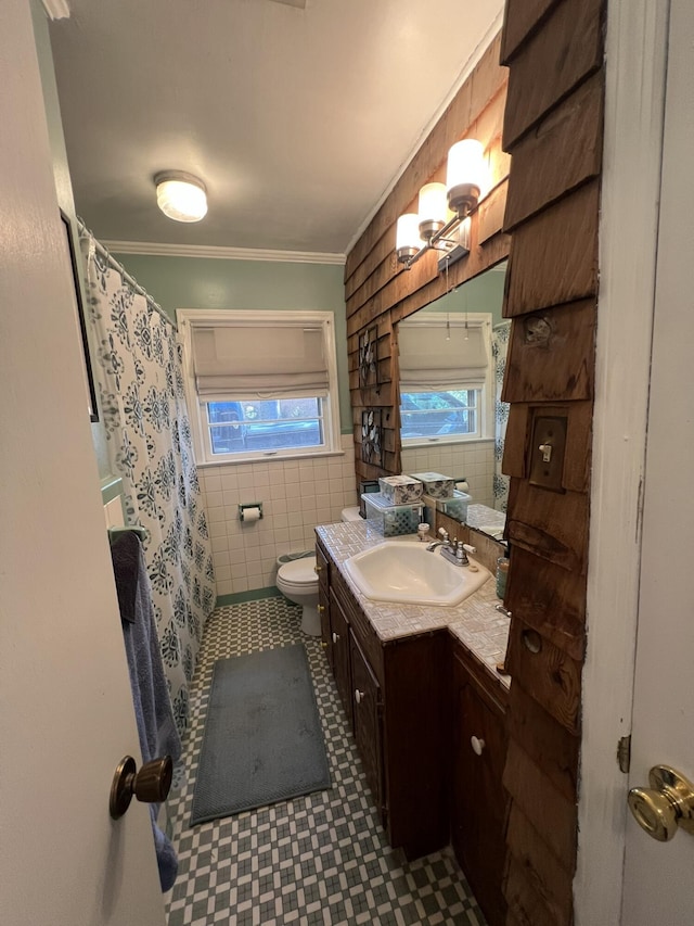 111 Newington Rd, Summerville, SC 29485 - full bathroom featuring toilet, a shower with shower curtain, vanity, tile walls, and ornamental molding
