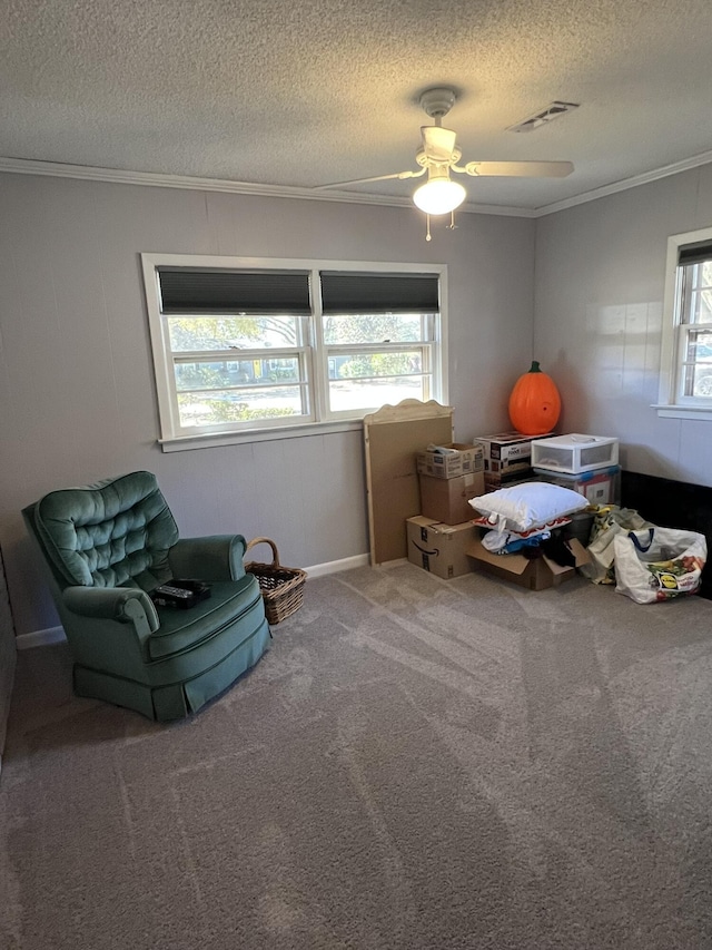 111 Newington Rd, Summerville, SC 29485 - living area with carpet floors, visible vents, ornamental molding, and a textured ceiling