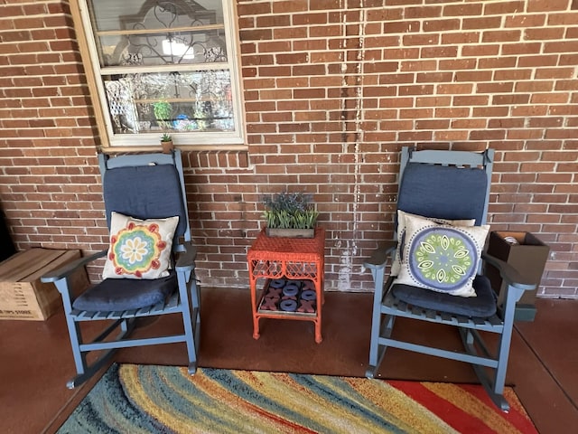 111 Newington Rd, Summerville, SC 29485 - sitting room featuring brick wall