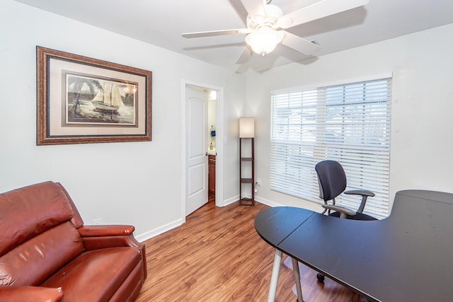 office area featuring ceiling fan and light hardwood / wood-style floors