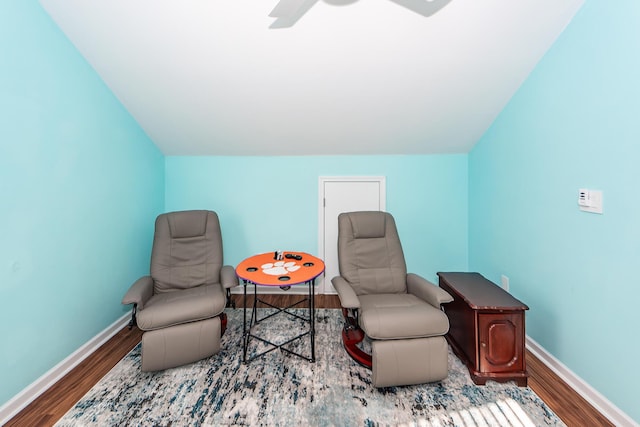 sitting room featuring ceiling fan and wood-type flooring