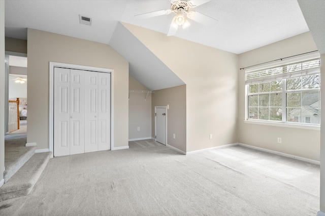 1458 Clarendon Way, Mount Pleasant, SC 29466 - unfurnished bedroom featuring light carpet, a closet, vaulted ceiling, ceiling fan, and baseboards