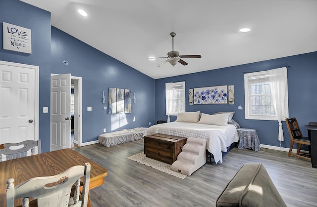 bedroom featuring recessed lighting, a ceiling fan, wood finished floors, high vaulted ceiling, and baseboards