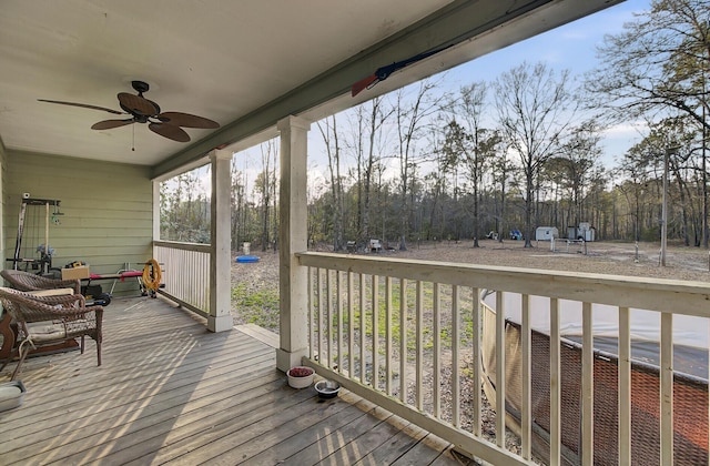 wooden terrace with ceiling fan