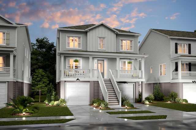 1668 Siloh Dr Unit 470, Mount Pleasant, SC 29466 - raised beach house with board and batten siding, driveway, a porch, a garage, and stairway