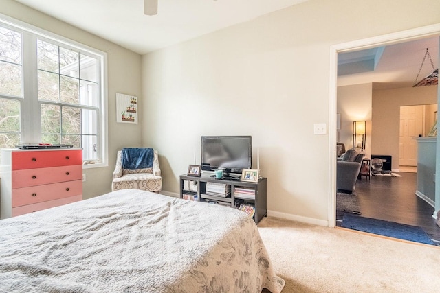 bedroom featuring ceiling fan and wood-type flooring