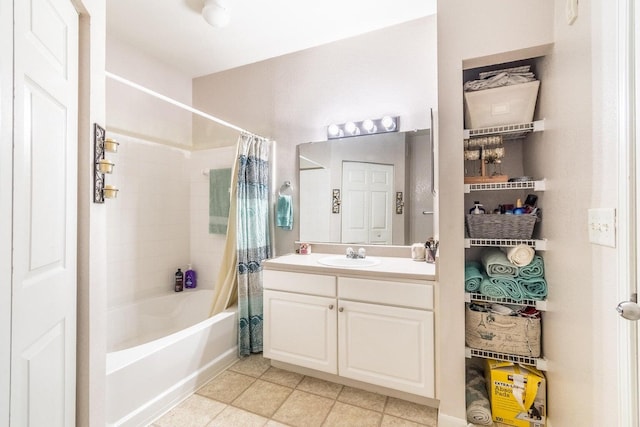 bathroom featuring tile patterned flooring, vanity, and shower / bath combination with curtain