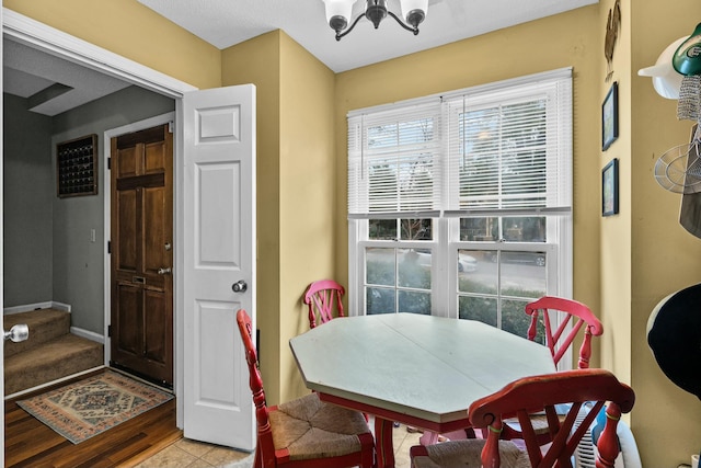 dining room with a notable chandelier