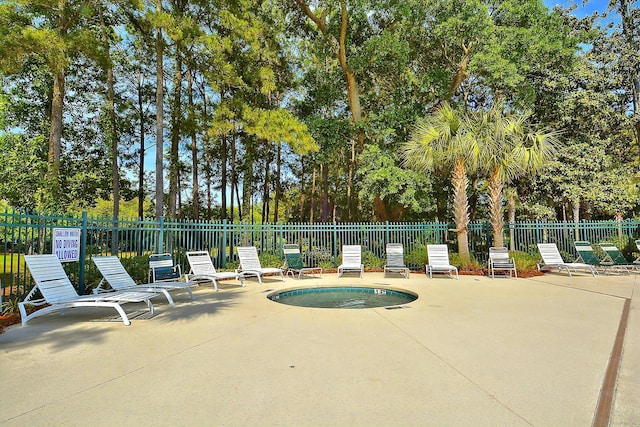 view of patio with a pool