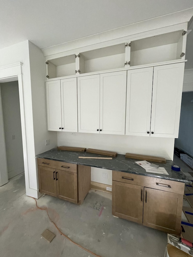 kitchen featuring white cabinetry