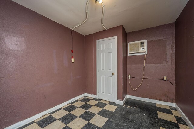 113 America St Unit A, B, C, D, Charleston, SC 29403 - interior space with tile patterned floors, a wall mounted air conditioner, and baseboards