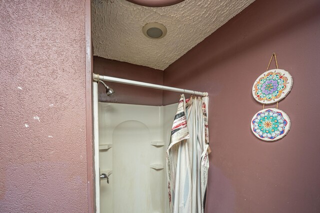 113 America St Unit A, B, C, D, Charleston, SC 29403 - bathroom with a textured ceiling and curtained shower