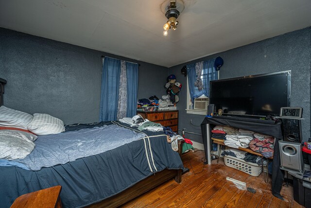 113 America St Unit A, B, C, D, Charleston, SC 29403 - bedroom featuring wood-type flooring, a textured wall, and cooling unit