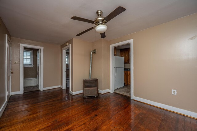 113 America St Unit A, B, C, D, Charleston, SC 29403 - unfurnished bedroom featuring freestanding refrigerator, baseboards, dark wood-style flooring, and ensuite bath
