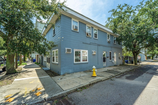 113 America St Unit A, B, C, D, Charleston, SC 29403 - view of front facade featuring an AC wall unit
