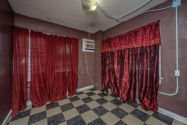 113 America St Unit A, B, C, D, Charleston, SC 29403 - empty room with tile patterned floors and a wall mounted air conditioner