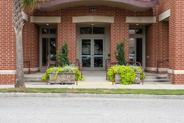 entrance to property featuring french doors