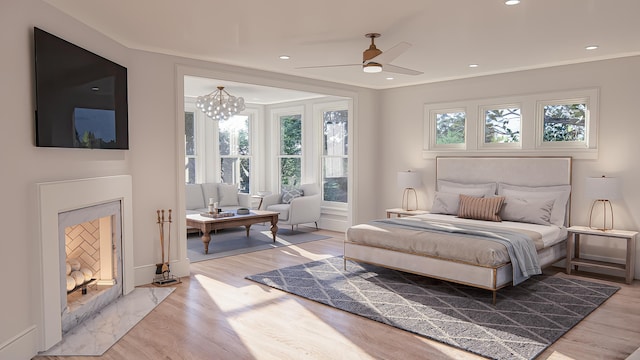 3307 Waterway Blvd, Isle Of Palms, SC 29451 - bedroom with light wood finished floors, a chandelier, recessed lighting, and a ceiling fan
