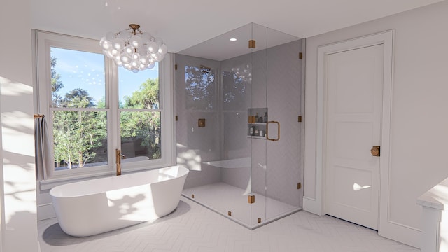 3307 Waterway Blvd, Isle Of Palms, SC 29451 - bathroom featuring a soaking tub, a stall shower, and a chandelier