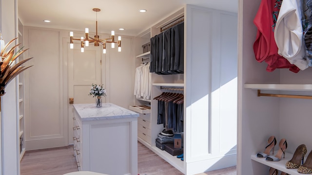 3307 Waterway Blvd, Isle Of Palms, SC 29451 - spacious closet with light wood-type flooring and a chandelier