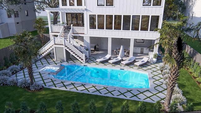 3307 Waterway Blvd, Isle Of Palms, SC 29451 - back of house with a pergola, stairs, a patio, and a pool with connected hot tub