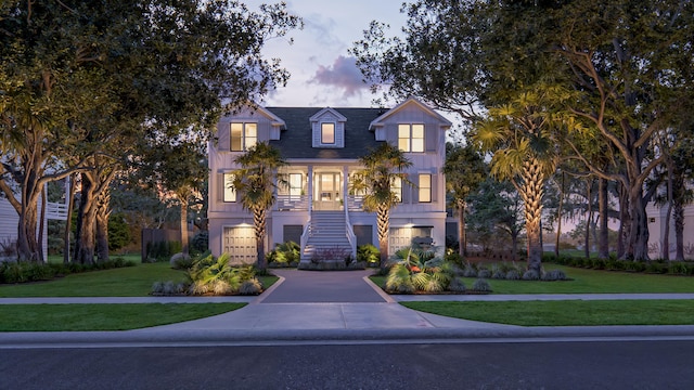3307 Waterway Blvd, Isle Of Palms, SC 29451 - view of front facade featuring stairway and a front lawn