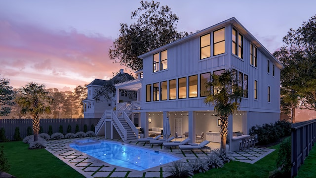 3307 Waterway Blvd, Isle Of Palms, SC 29451 - back of house featuring a patio area, board and batten siding, outdoor lounge area, and stairs