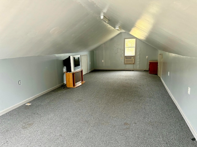 bonus room with carpet and lofted ceiling