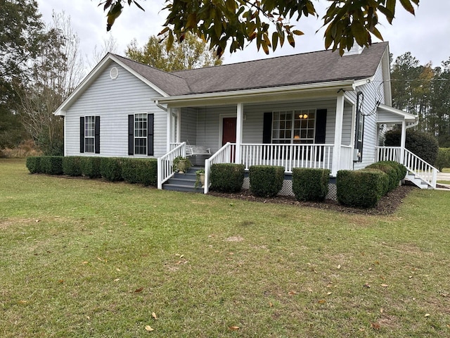 ranch-style house featuring a front lawn