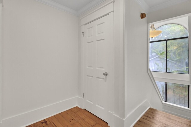2159 Spoleto Ln Unit E, North Charleston, SC 29406 - corridor with light wood-style flooring, crown molding, and baseboards