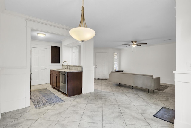 2159 Spoleto Ln Unit E, North Charleston, SC 29406 - kitchen with dishwasher, a sink, light countertops, dark brown cabinetry, and crown molding