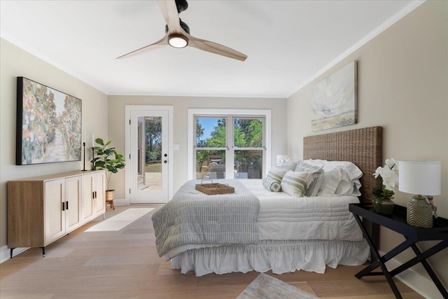 bedroom featuring light wood-type flooring, access to exterior, a ceiling fan, and ornamental molding