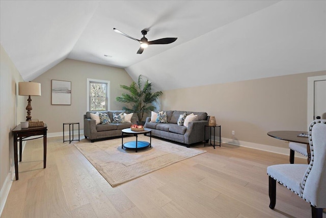 living room with vaulted ceiling, baseboards, light wood-type flooring, and ceiling fan