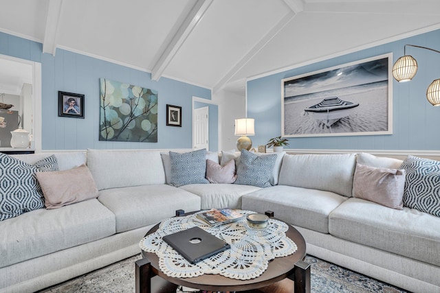 living area featuring vaulted ceiling with beams