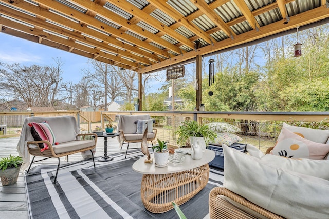 deck featuring fence and an outdoor hangout area