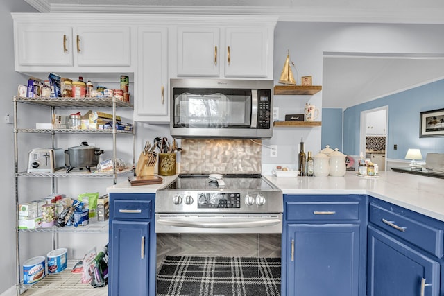 kitchen featuring appliances with stainless steel finishes, blue cabinets, and open shelves