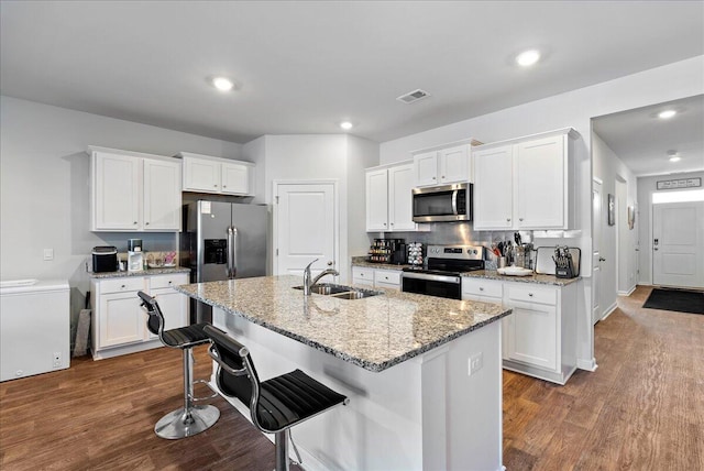 kitchen featuring white cabinets and stainless steel appliances