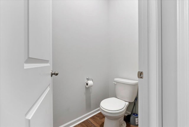 bathroom featuring toilet and hardwood / wood-style floors