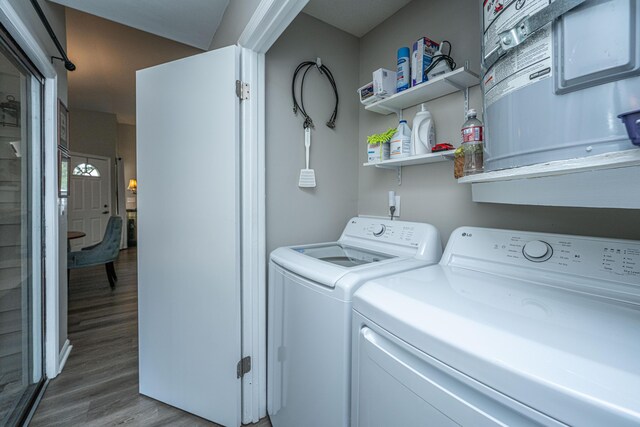 717 Temple Rd Unit B, Ladson, SC 29456 - laundry room with washer and dryer and light wood-type flooring
