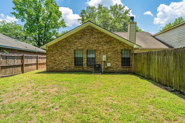 717 Temple Rd Unit B, Ladson, SC 29456 - rear view of house with a chimney and brick siding