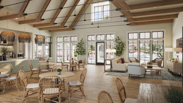 lobby with a high ceiling and beamed ceiling