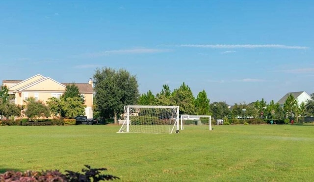 view of community with a sport area