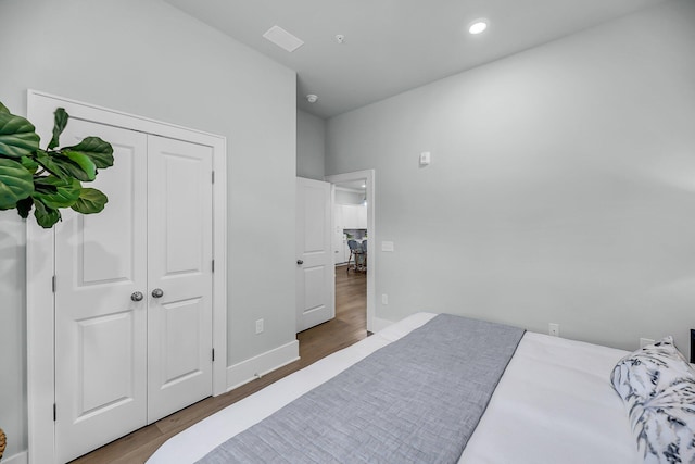 7416 Indigo Palms Way, Johns Island, SC 29455 - bedroom featuring wood finished floors, baseboards, recessed lighting, and a closet