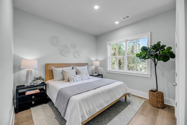 7416 Indigo Palms Way, Johns Island, SC 29455 - bedroom with baseboards, recessed lighting, and light wood-type flooring