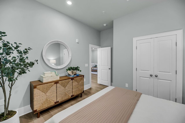 7416 Indigo Palms Way, Johns Island, SC 29455 - bedroom featuring wood finished floors, baseboards, a closet, and recessed lighting